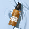 product image-4,UpCircle Ceramide Gel Moisturiser bottle lying in a pool of the clear cooling gel